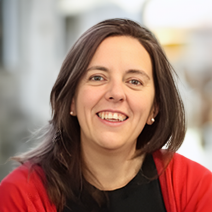 Woman wearing a red sweater with a black shirt